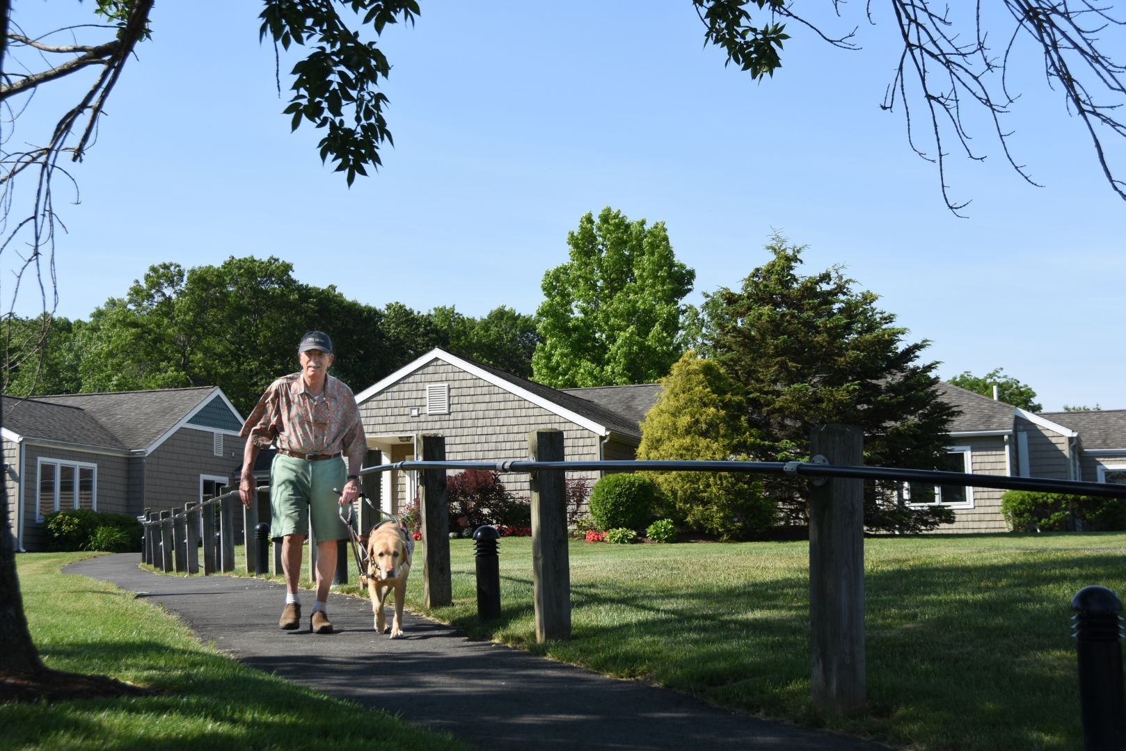 2_resident_walking_dog.jpg