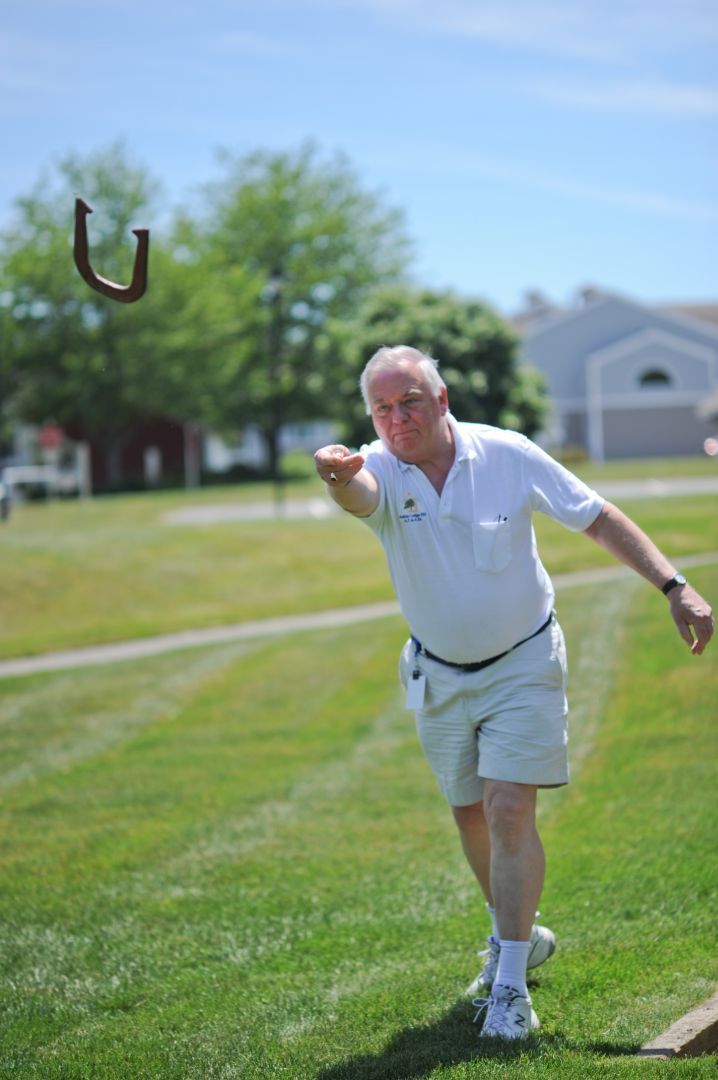 17_resident_playing_horse_shoes.jpg