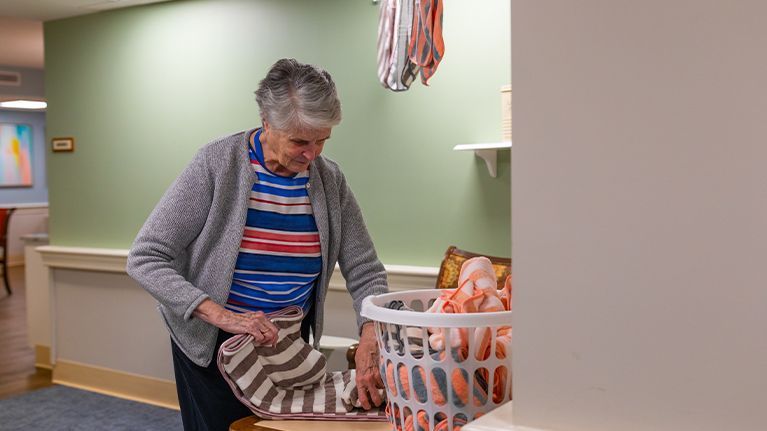 Masonicare resident folding laundry